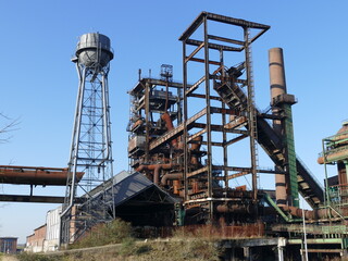 Fototapeta na wymiar The industrial ruins of the blast furnaces at the Phoenix plant are part of the Industrial Culture Route in Dortmund, North Rhine-Westphalia, Germany Industrieruinen der Hochöfen des Werkes Phönix