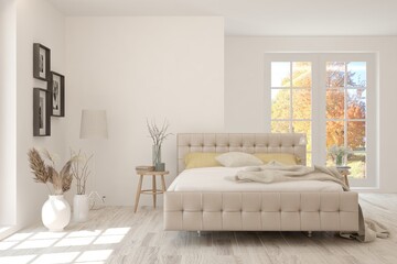 White stylish minimalist bedroom with autumn landscape in window. Scandinavian interior design. 3D illustration