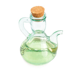 Glass jug with vegetable oil isolated on a white .