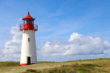 Fototapeta na wymiar Red and White lighthouse in Sylt Germany