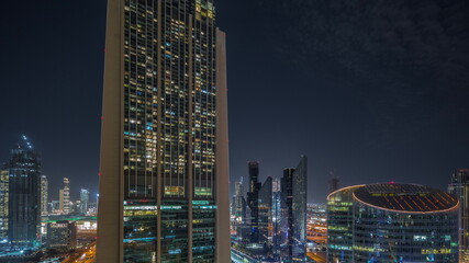 Obraz premium Dubai international financial center skyscrapers aerial night timelapse.