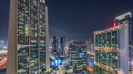 Dubai international financial center skyscrapers aerial all night timelapse.