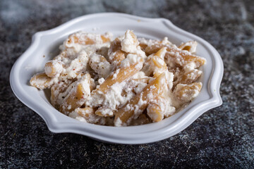 Pasta with ricotta cheese, typical Italian dish. Adapt for a vegetarian diet.