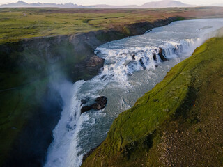 Beautiful aerial view of Iceland Gullfoss waterfall with a rainbow in the Golden Circule
