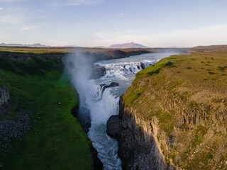 Beautiful aerial view of Iceland Gullfoss waterfall with a rainbow in the Golden Circule