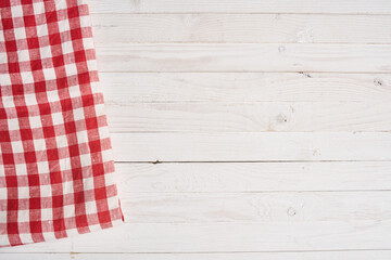 Red checkered tablecloth wooden background texture kitchen decoration - obrazy, fototapety, plakaty