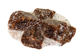 macro mineral stone Staurolite on a white background