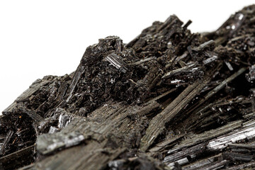 Macro stone black mineral tourmaline Scherl on white background