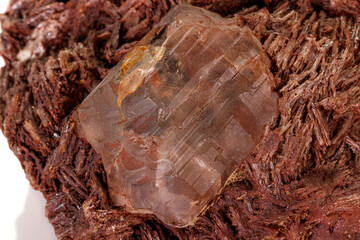 Macro stone Topaz mineral in rock on a white background