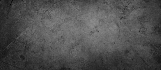 Dark grey textured concrete grunge wall background