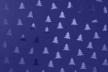 Color of the year 2022 Very Peri. Trendy color concept. Christmas tree foil confetti pattern on creative abstract background. Winter, Christmas, New Year celebration concept. Holiday flat layout