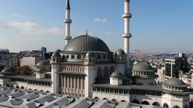 The Taksim Mosque. Taksim Square with people