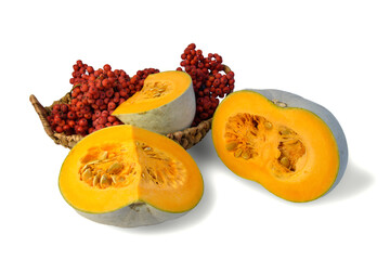 pumpkin slices , basket with.red mountain ash berries, large on a white background, isolate