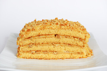 The hand-made custard honey cake with walnuts inside - 474070348