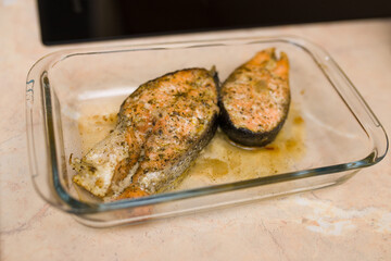Baked trout. Proper nutrition. Fish in the oven. Healthy fats. Baked salmon on a baking sheet.