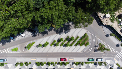 aerial top view of street with parking lot near new residential housing complex