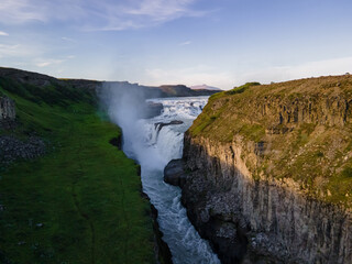 Fototapeta na wymiar Beautiful aerial view of Iceland Gullfoss waterfall with a rainbow in the Golden Circule