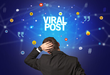 Rear view of a businessman, social media concept