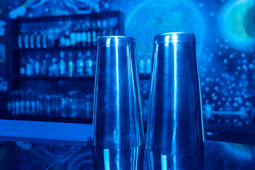Two shakers bar tools for mixing liquids and preparing alcoholic cocktails