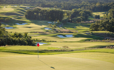 View of a well groomed golf course.