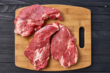 meat steak food cooking dark wood background
