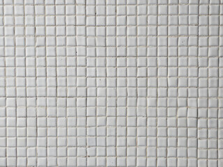 Square ceramic mosaic pattern, white ceramic tile with many little squares