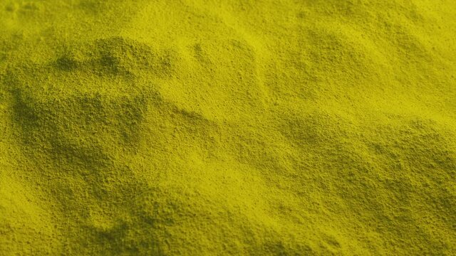 Powder Yellow Colored Material Tracking Shot