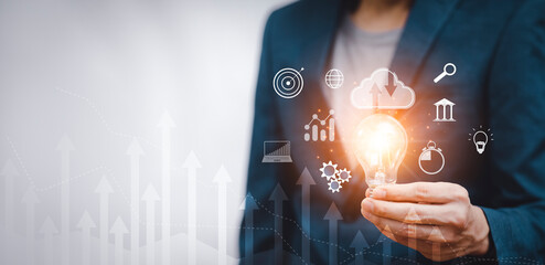 Concept creativity with light bulbs and energy power, Man hand holding light bulbs, ideas of new...