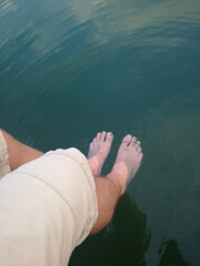 hand on the water