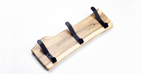 Wooden hanger. Metal hook for hanging. Epoxy resin elements. Loft hanger. Furniture. On white background.