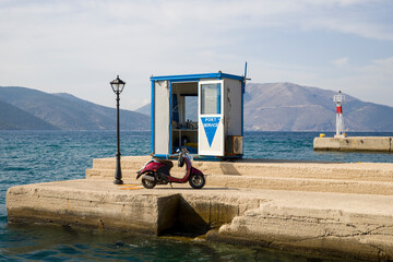 Port service building with a bike on the pier