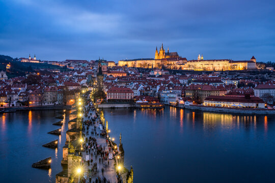 Prague skyline at night with view of Charles Bridge and Prague Castle