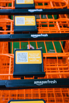 Bellevue, WA, USA - September 06, 2021; Orange grocery carts close up outside the Amason Frest location in Factoria Washington a neighborhood of Bellevue