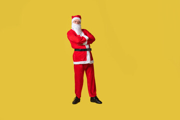 Fototapeta na wymiar Santa claus yellow funny style, there is a tradition of holiday winter senior, elderly happy. Hat red Caucasian, time arms crossed rests