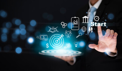 New Targeting the icon business and human concept, Businessman holding virtual target dart board and touch Start word ,Executive marketing, investment goal and target for business investment concept.