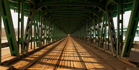 train tracks leading inside the bridge © Tmk Visuals