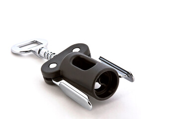 Black and metallic corkscrew on white background with space for text, minimal concept, wine bottle...