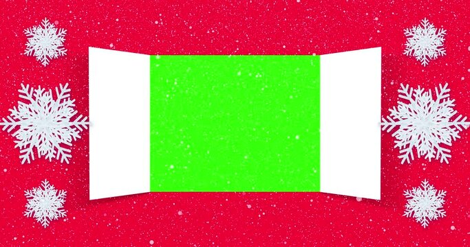 Christmas advent calendar door opening on red background and large 3d snowflakes. On Christmas day an open wide doors to reveal green screen for message. 4K video graphic animation