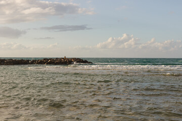 Coastal stones breakwaters on the beach in Haifa