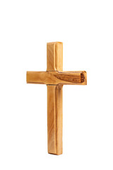 Wooden crucifix standing on white background.