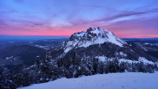 Winter frozen mountain panorama landscape in Slovakia, Red sky before sunrise. FHD