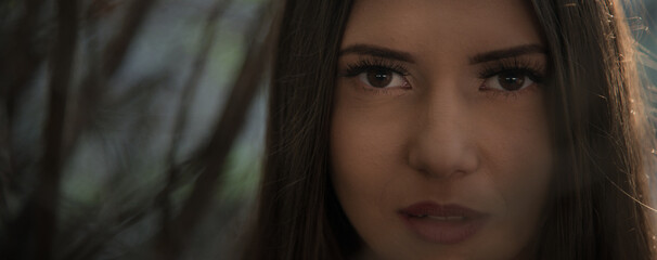 Portrait of a girl in the woods