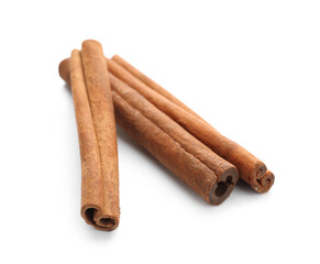Natural cinnamon sticks on white background