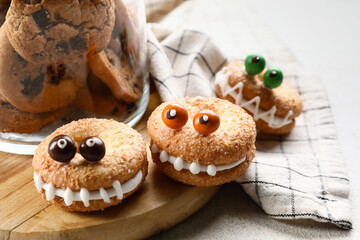 Funny cookies for Halloween on table