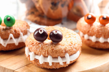 Funny cookies for Halloween on table, closeup