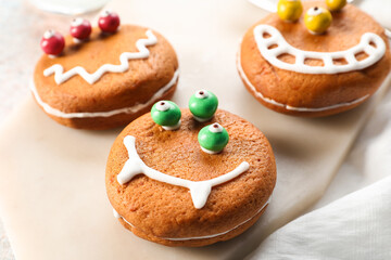 Funny cookies for Halloween on table