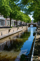 Obraz premium Walking on old streets of Harlingen fisherman town on Wadden sea, Friesland, Netherlands