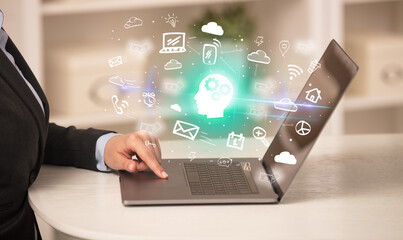 Businessman working on laptop with new business concept