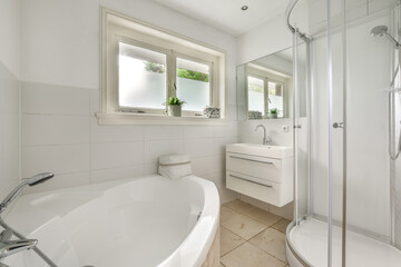 Fototapeta na wymiar Bright elegant bathroom interior in a luxury house