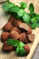 Selective focus. Fresh mint leaves and chocolate mint truffle. Mint chocolate.